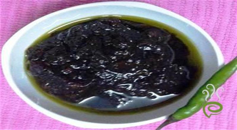 Puli Milagai Oorukai :Tamarind Green Chilli Pickle