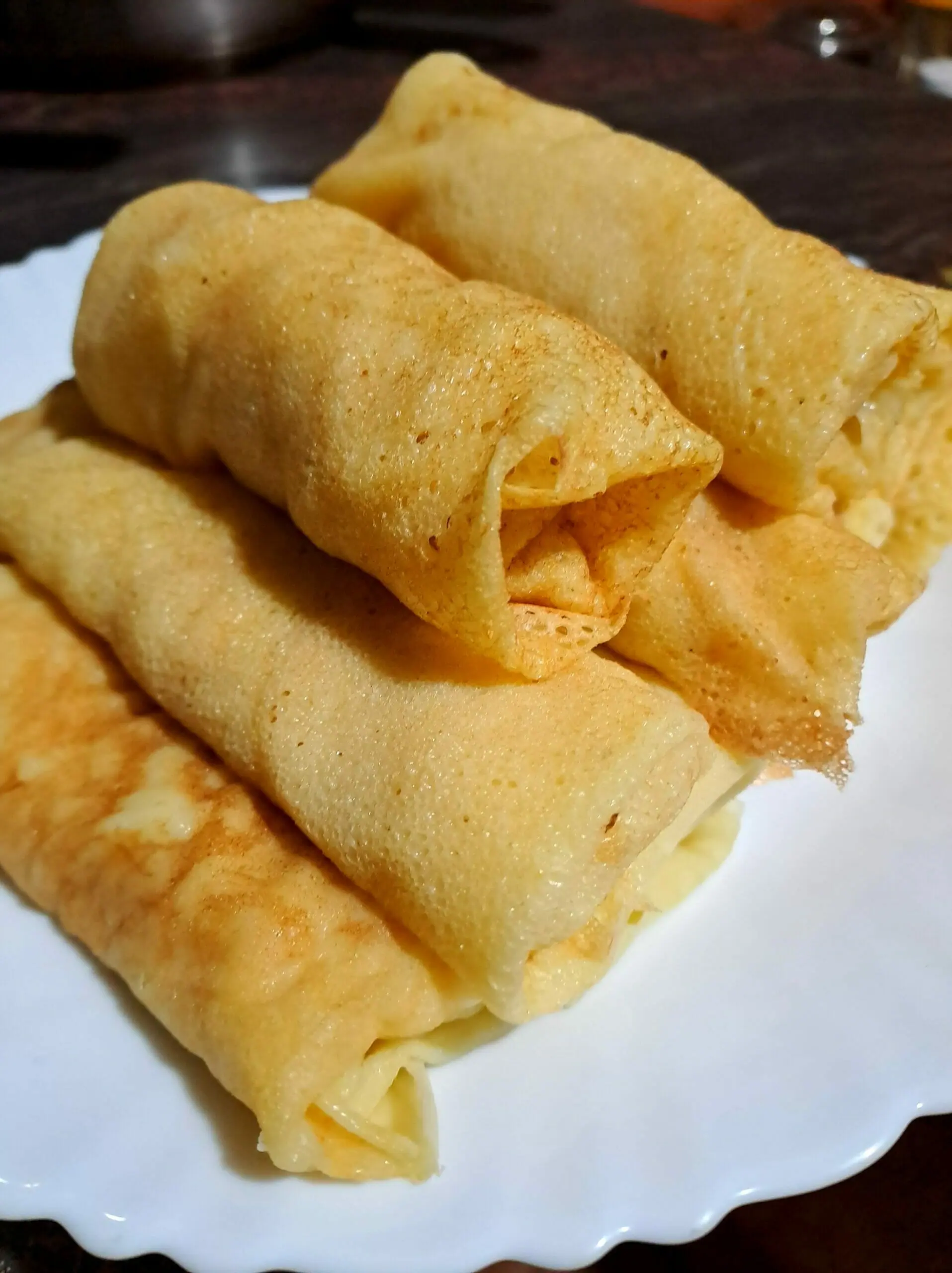 Sweet Coconut stuffed Crepes | Sri Lankan Pani Pol (Coconut Pancakes) - The  Flavor Bender